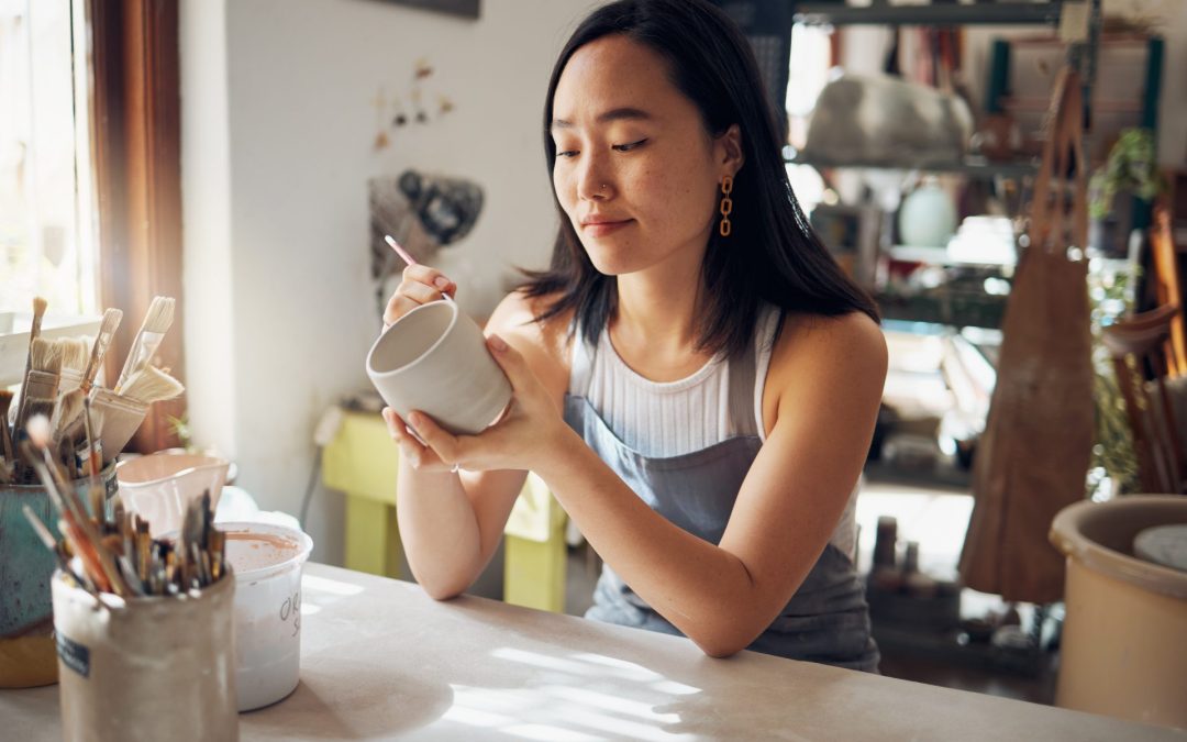 Woman does pottery as a hobby.