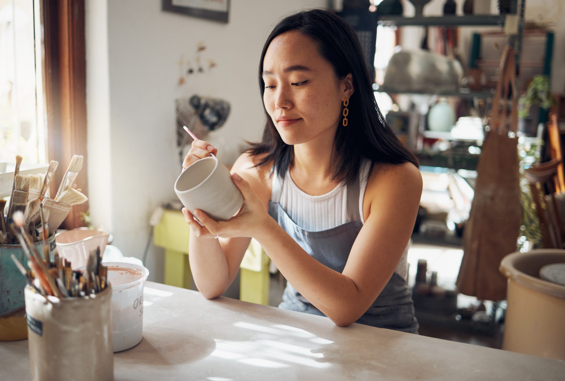 pottery-art-and-sculpture-with-a-japanese-woman-i-2023-01-13-00-07-02-utc Woman does pottery as a hobby.
